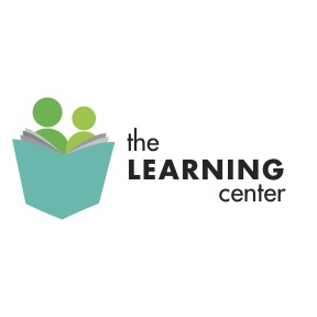 the learning center beside an adult and child reading together