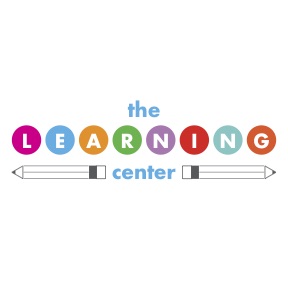 the learning center with learning letters in circles and center flanked by pencils